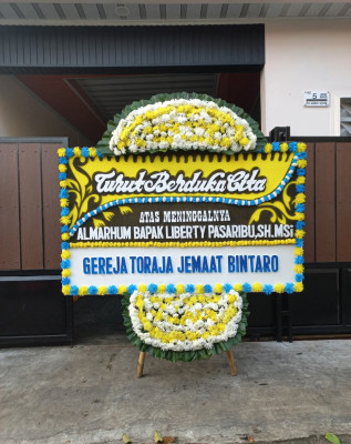 Papan Bunga Duka di Limbato